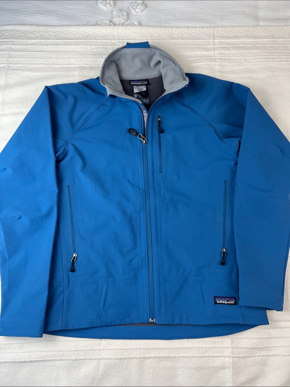 Patagonia Women’sBright Blue Softshell Jacket w/Gray Lining, custom embroidery